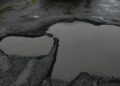 Pothole-riddled roads continue to plague commuters in Kochi city
