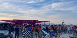 Burning Man 2025 particpants at a tents. 